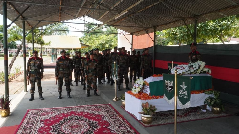 Assam Rifles personnel pay their last respects to a fallen soldier, who was killed in the IED blast near Khopanala in Nagaland's Chümoukedima district on July 13.